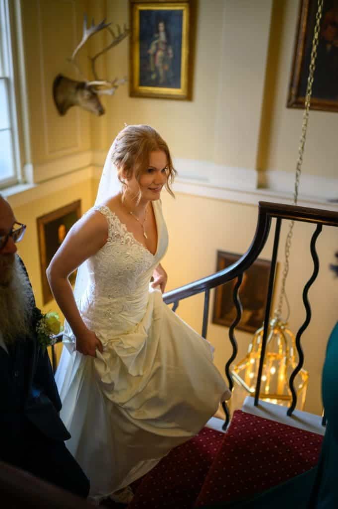 Bride on the stairs at Owston Hall Hotel Doncaster