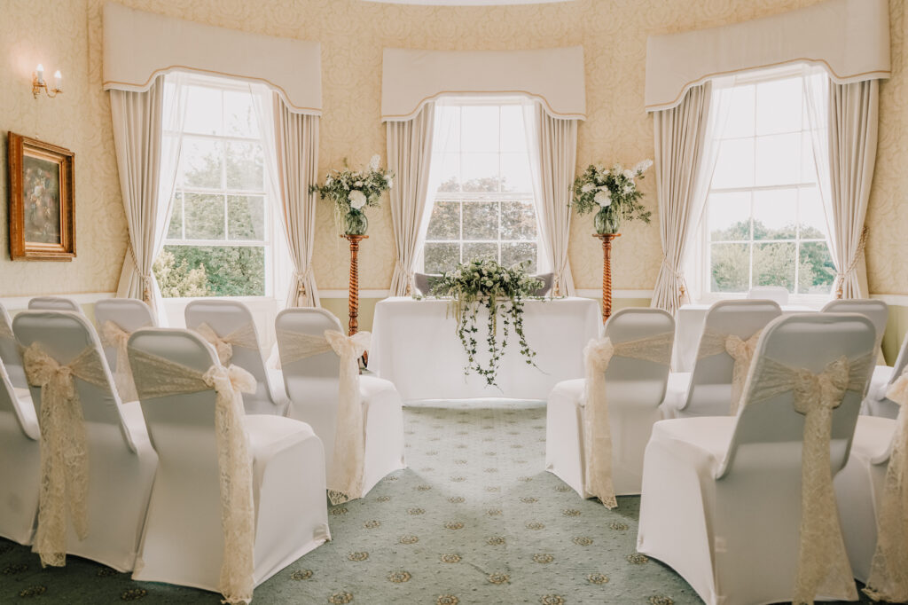 A small wedding ceremony at Owston Hall Hotel Doncaster in teh De Lacey Suite